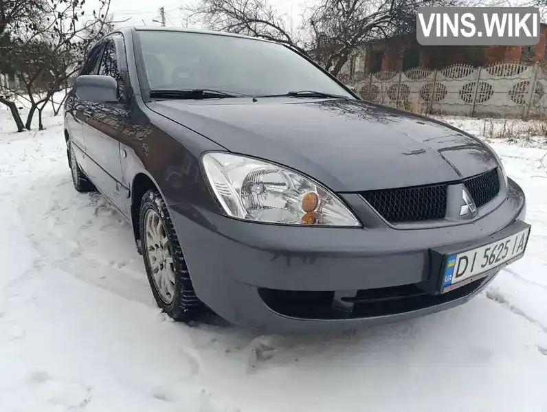 Седан Mitsubishi Lancer 2009 1.58 л. Ручная / Механика обл. Харьковская, Харьков - Фото 1/15