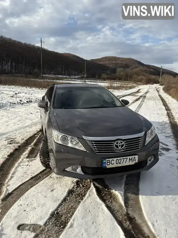 Седан Toyota Camry 2014 2.49 л. Автомат обл. Львовская, Львов - Фото 1/21