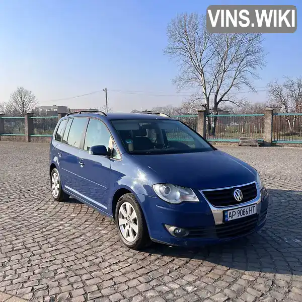 Мінівен Volkswagen Touran 2009 1.39 л. Автомат обл. Запорізька, Запоріжжя - Фото 1/15