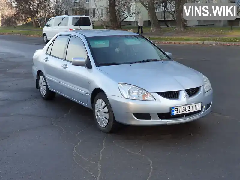 Седан Mitsubishi Lancer 2004 1.58 л. Ручна / Механіка обл. Полтавська, Кременчук - Фото 1/17