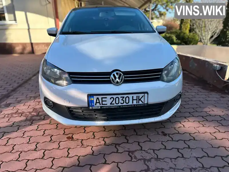 Седан Volkswagen Polo 2012 1.6 л. Ручна / Механіка обл. Дніпропетровська, Дніпро (Дніпропетровськ) - Фото 1/12