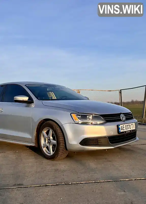 Седан Volkswagen Jetta 2013 2.48 л. Автомат обл. Дніпропетровська, Новомосковськ - Фото 1/19