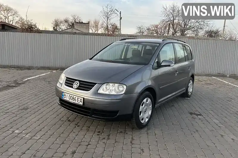 Минивэн Volkswagen Touran 2005 1.6 л. Ручная / Механика обл. Полтавская, Кременчуг - Фото 1/21