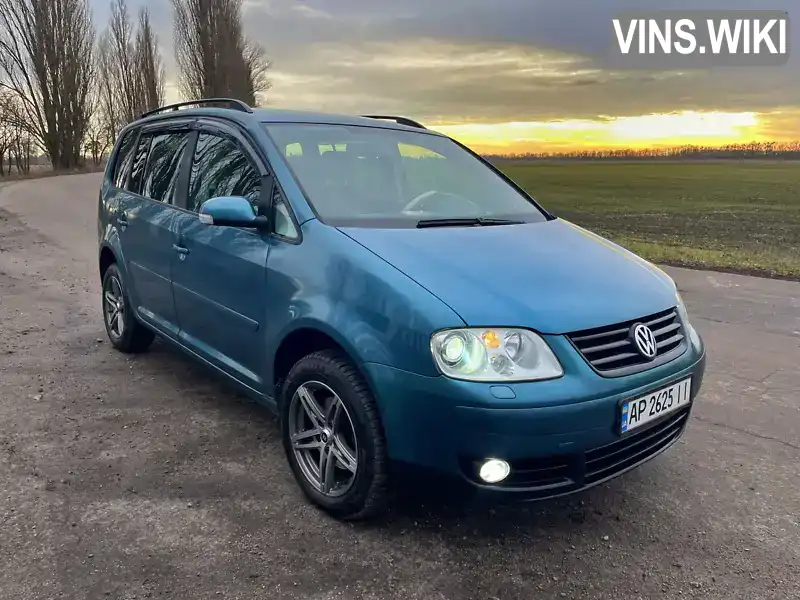 Мінівен Volkswagen Touran 2004 2 л. Автомат обл. Київська, Біла Церква - Фото 1/21