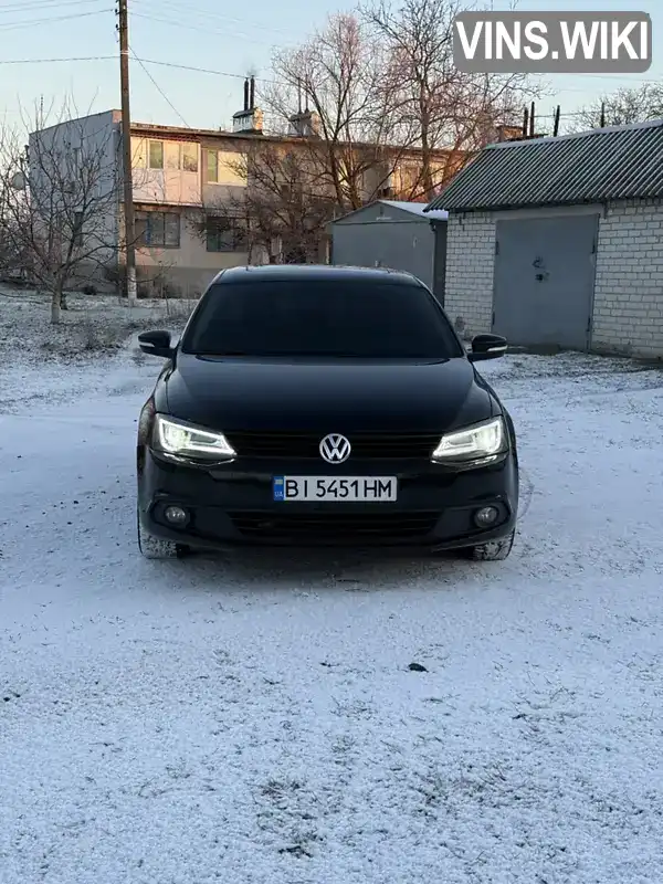 Седан Volkswagen Jetta 2014 1.8 л. Автомат обл. Полтавская, Кременчуг - Фото 1/21