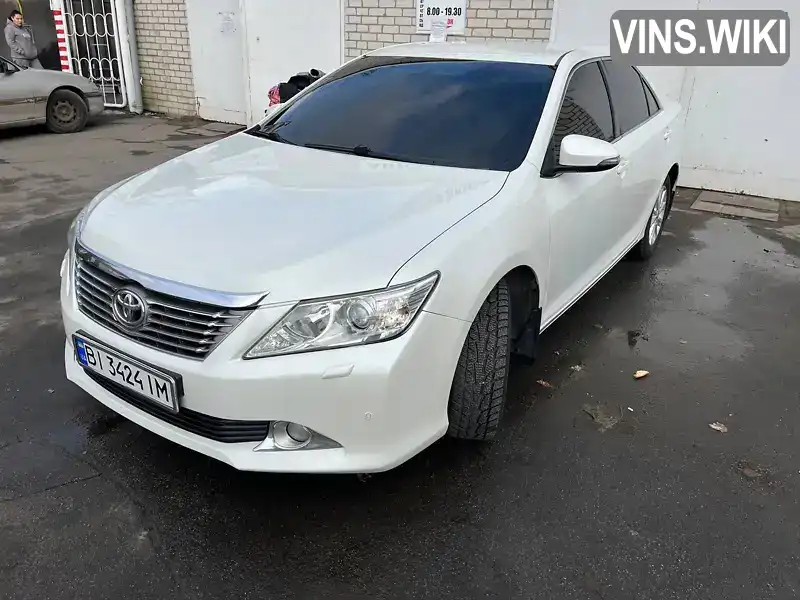 Седан Toyota Camry 2013 2.49 л. Автомат обл. Полтавская, Кременчуг - Фото 1/21