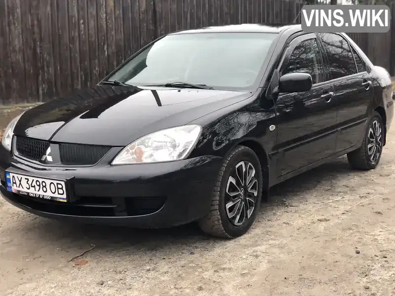 Седан Mitsubishi Lancer 2008 1.6 л. Автомат обл. Харьковская, Харьков - Фото 1/21