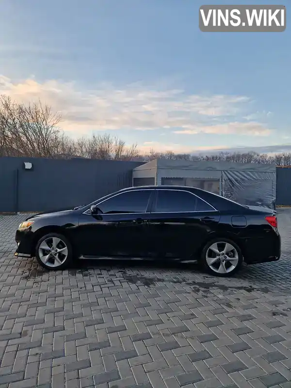 Седан Toyota Camry 2014 2.49 л. Автомат обл. Полтавская, Полтава - Фото 1/21