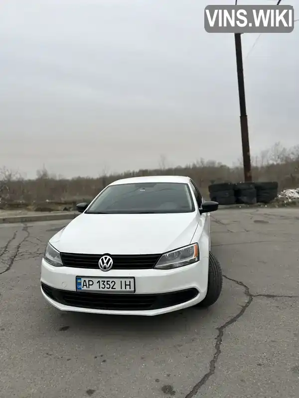 Седан Volkswagen Jetta 2013 1.98 л. Автомат обл. Запорожская, Запорожье - Фото 1/13