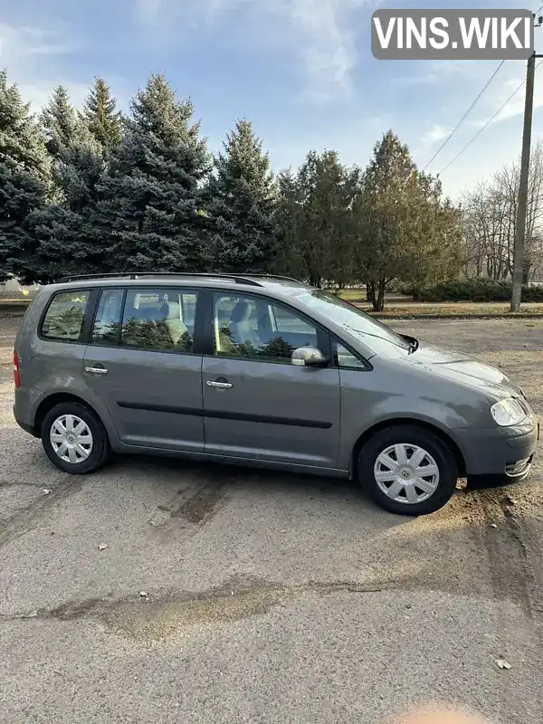 Мінівен Volkswagen Touran 2004 1.6 л. Ручна / Механіка обл. Дніпропетровська, Дніпро (Дніпропетровськ) - Фото 1/11