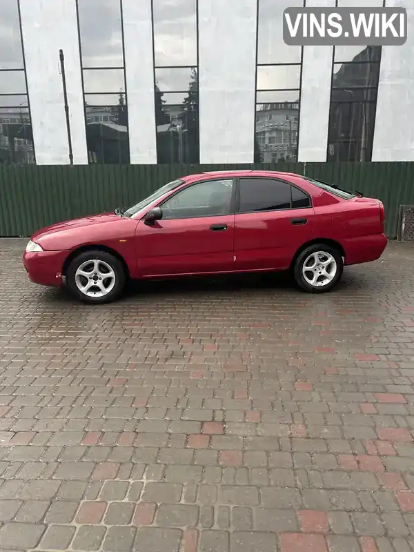 Ліфтбек Mitsubishi Carisma 1998 1.6 л. Ручна / Механіка обл. Хмельницька, Хмельницький - Фото 1/7