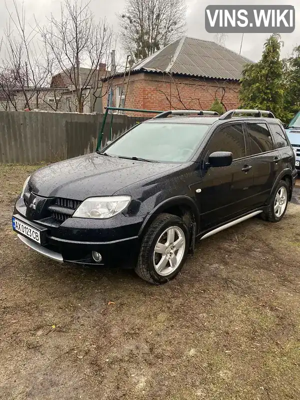 Позашляховик / Кросовер Mitsubishi Outlander 2009 2 л. Ручна / Механіка обл. Харківська, Харків - Фото 1/14