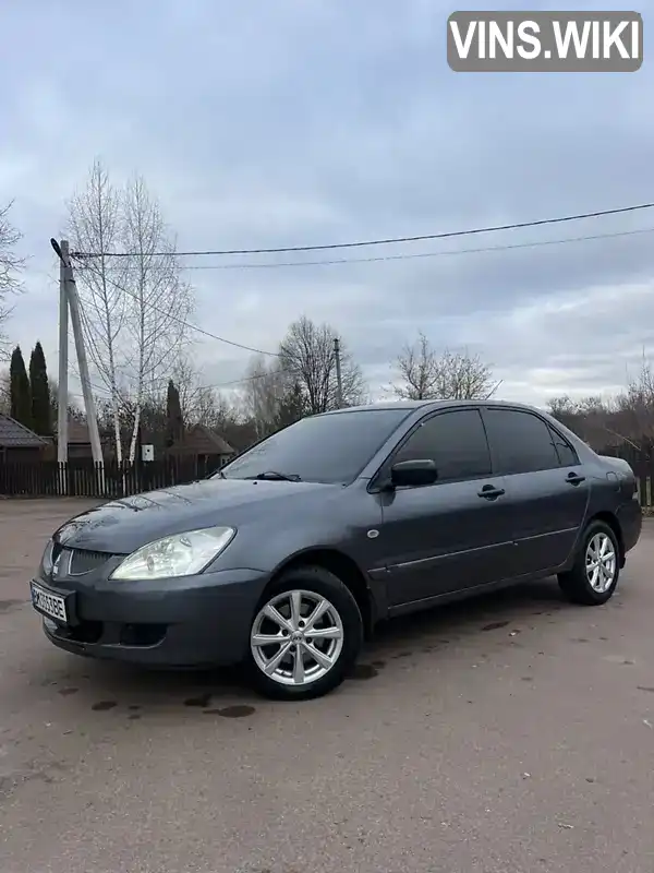 Седан Mitsubishi Lancer 2004 1.6 л. Ручная / Механика обл. Харьковская, Харьков - Фото 1/21