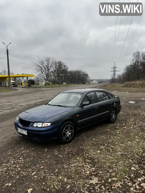 JMZGF14R201236392 Mazda 626 1999 Хэтчбек 2 л. Фото 1