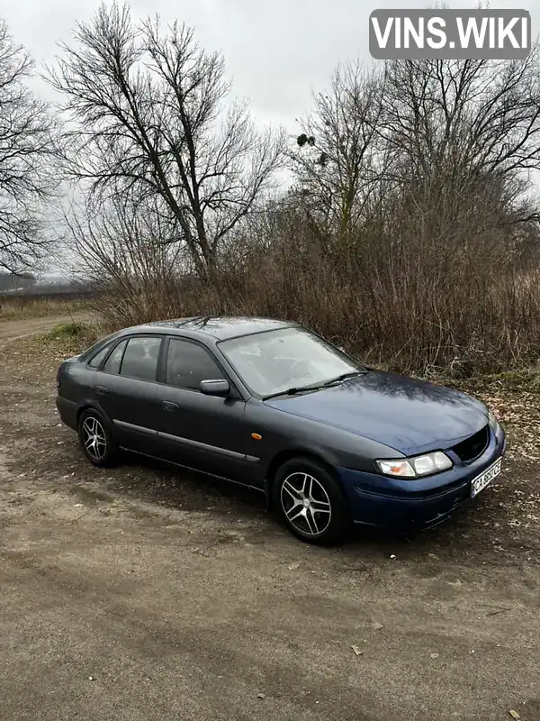 JMZGF14R201236392 Mazda 626 1999 Хэтчбек 2 л. Фото 2