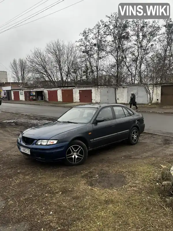 JMZGF14R201236392 Mazda 626 1999 Хэтчбек 2 л. Фото 6