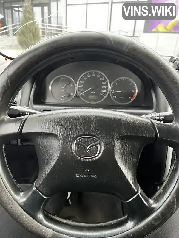 JMZGF14R201236392 Mazda 626 1999 Хэтчбек 2 л. Фото 8