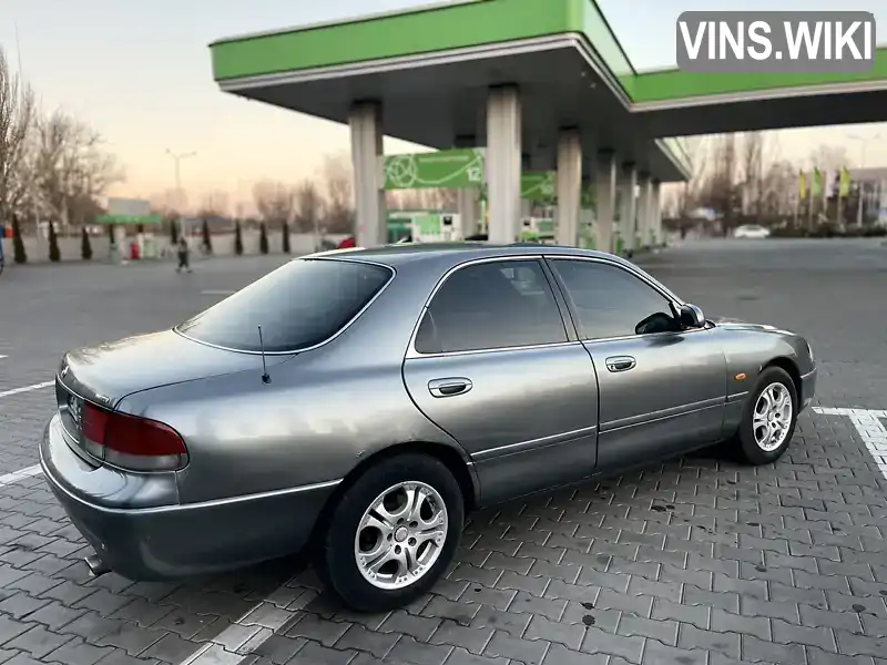 JM7GE10S200111382 Mazda 626 1996 Седан 2 л. Фото 6