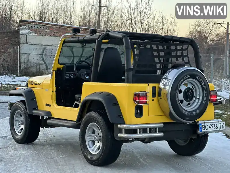 1J4FY19P6RP419896 Jeep Wrangler 1994 Позашляховик / Кросовер 2.47 л. Фото 6