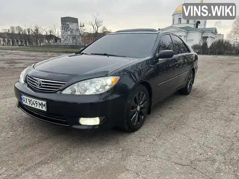 Седан Toyota Camry 2004 2.36 л. Автомат обл. Харьковская, Харьков - Фото 1/21