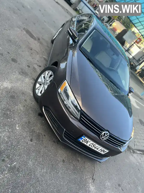 Седан Volkswagen Jetta 2014 1.8 л. Автомат обл. Ровенская, Ровно - Фото 1/4