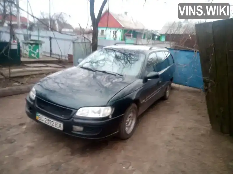 W0L000022S1034207 Opel Omega 1995 Универсал 2.5 л. Фото 6