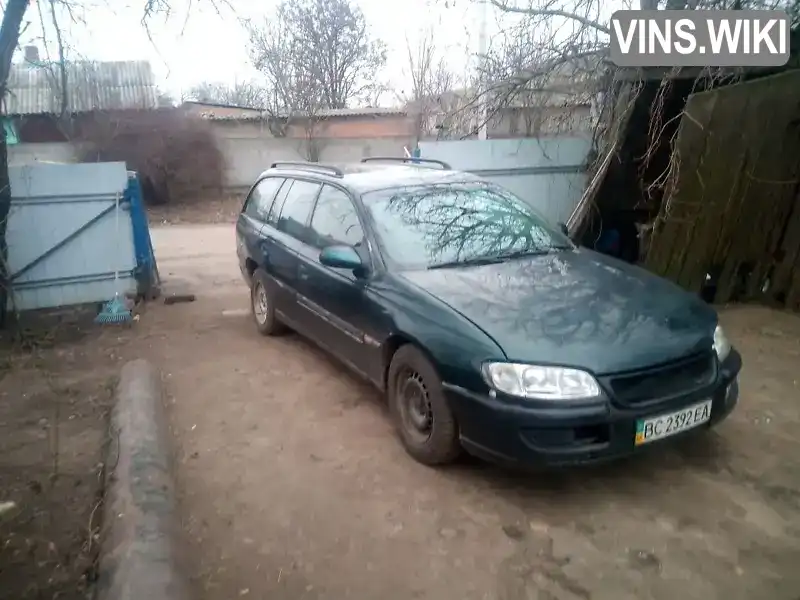 W0L000022S1034207 Opel Omega 1995 Универсал 2.5 л. Фото 7