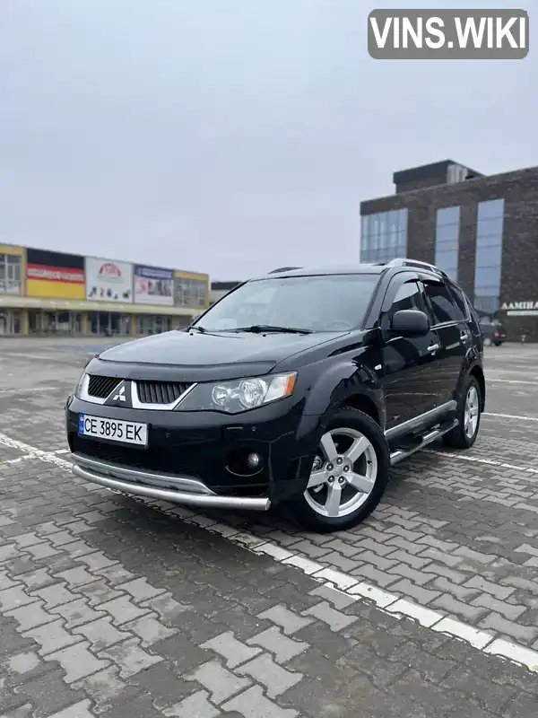 Позашляховик / Кросовер Mitsubishi Outlander XL 2008 2.4 л. Варіатор обл. Чернівецька, Чернівці - Фото 1/21