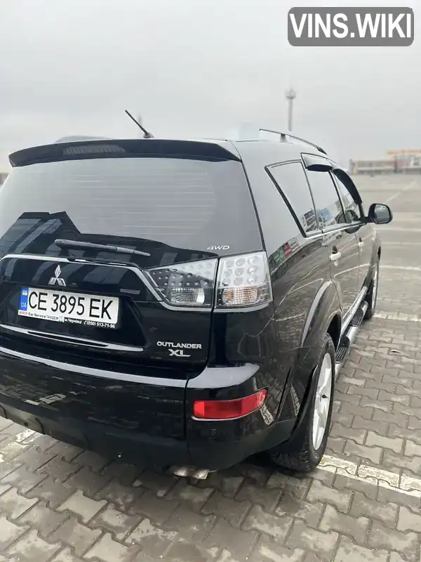 JMBXTCW5W8Z009857 Mitsubishi Outlander XL 2008 Внедорожник / Кроссовер 2.4 л. Фото 4