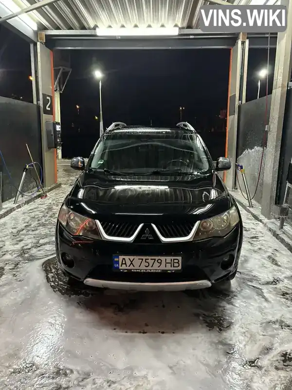 Внедорожник / Кроссовер Mitsubishi Outlander XL 2008 2.4 л. Вариатор обл. Харьковская, Харьков - Фото 1/21