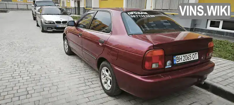 JSAEGC11S00146668 Suzuki Baleno 1998 Седан  Фото 4