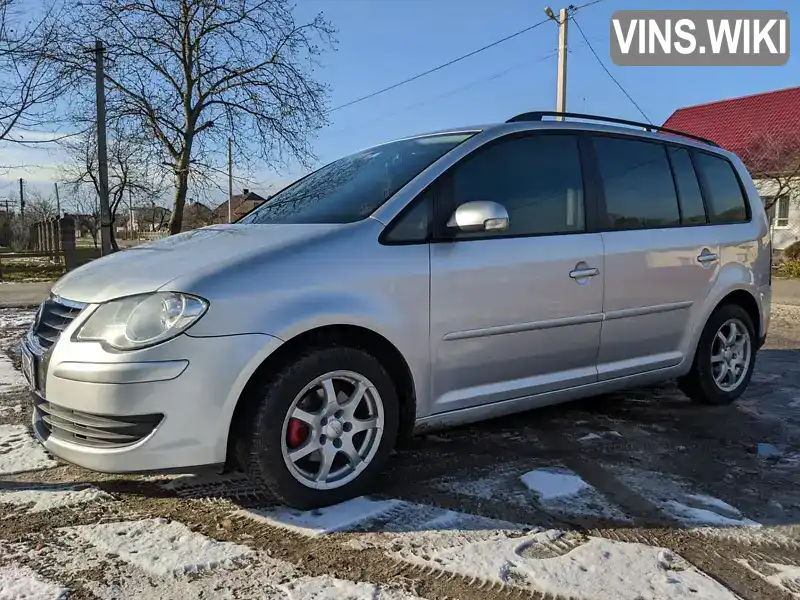 Мінівен Volkswagen Touran 2008 1.39 л. обл. Волинська, Камінь-Каширський - Фото 1/11