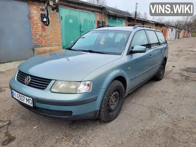 WVWZZZ3BZXE019209 Volkswagen Passat 1998 Універсал 1.6 л. Фото 1