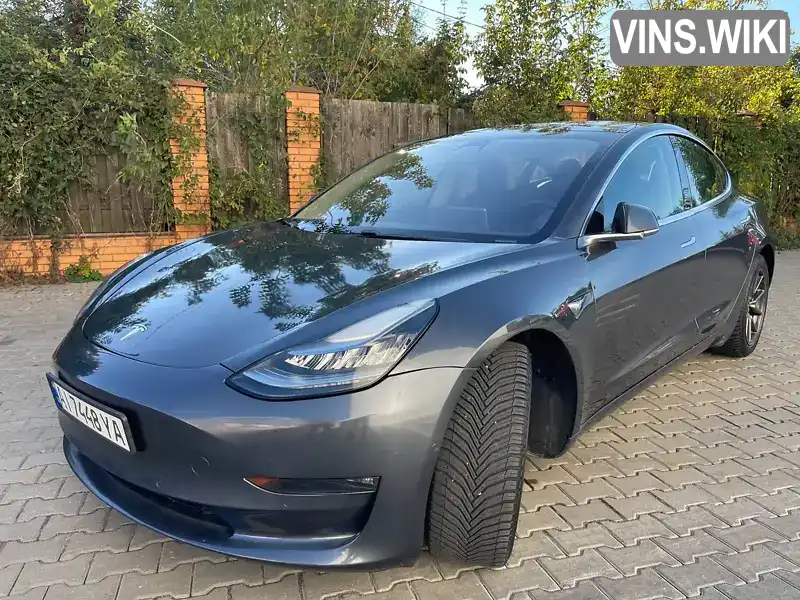 Седан Tesla Model 3 2018 null_content л. Автомат обл. Київська, Вишневе - Фото 1/21