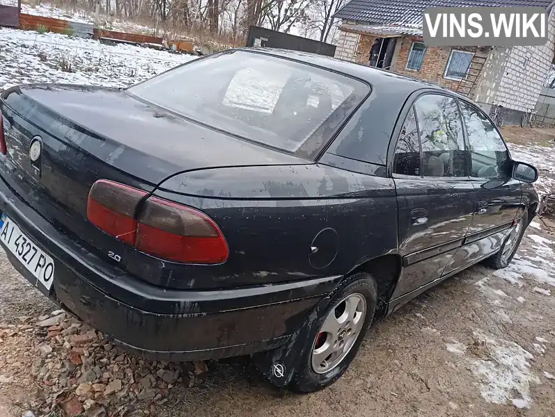 W0L000025V1171728 Opel Omega 1997 Седан 2 л. Фото 9