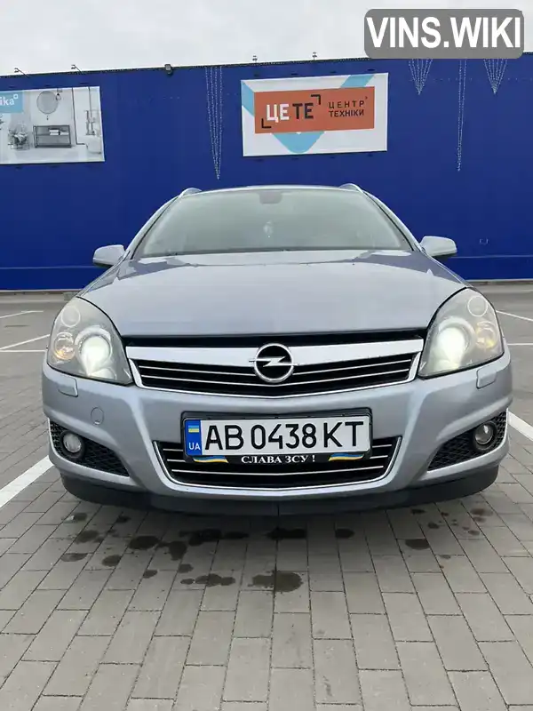 Универсал Opel Astra 2009 1.6 л. Ручная / Механика обл. Киевская, Вышневое - Фото 1/21