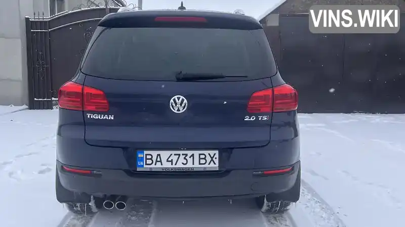 WVGAV7AX1FW565269 Volkswagen Tiguan 2014 Внедорожник / Кроссовер 2 л. Фото 2