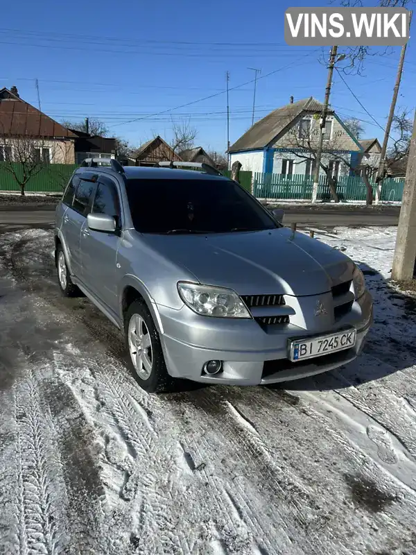 Внедорожник / Кроссовер Mitsubishi Outlander 2008 2.38 л. Автомат обл. Полтавская, Гадяч - Фото 1/5