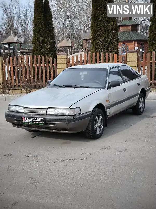 Седан Mazda 626 1990 1.8 л. Ручна / Механіка обл. Дніпропетровська, Дніпро (Дніпропетровськ) - Фото 1/20