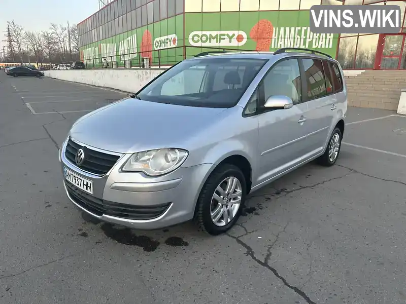 Мінівен Volkswagen Touran 2008 1.97 л. Ручна / Механіка обл. Миколаївська, Миколаїв - Фото 1/21