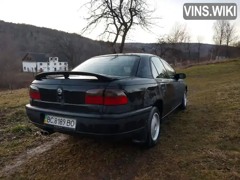 W0L000026S1100938 Opel Omega 1995 Седан 2 л. Фото 2