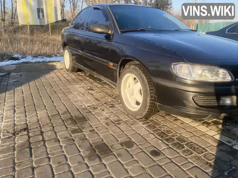 W0L000026T1186423 Opel Omega 1996 Седан 2 л. Фото 2