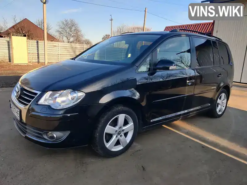 Мінівен Volkswagen Touran 2008 1.9 л. Ручна / Механіка обл. Кіровоградська, Гайворон - Фото 1/11