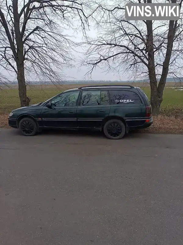 W0L000022R1136191 Opel Omega 1994 Універсал 2.5 л. Фото 7