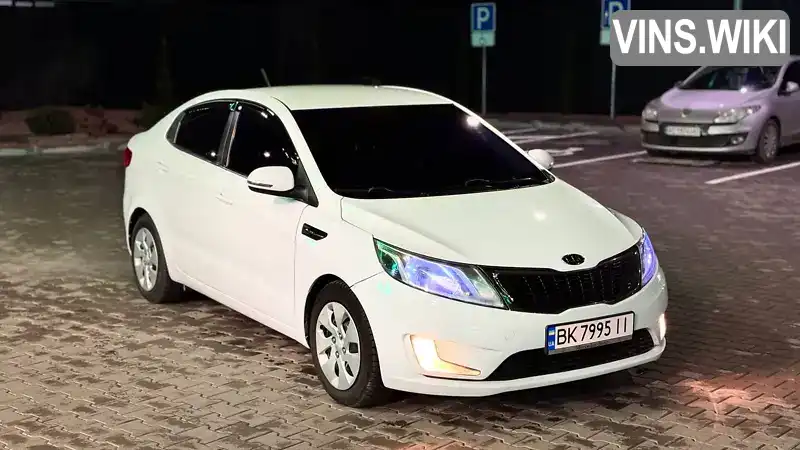 Седан Kia Rio 2012 1.4 л. Ручна / Механіка обл. Рівненська, Рівне - Фото 1/21