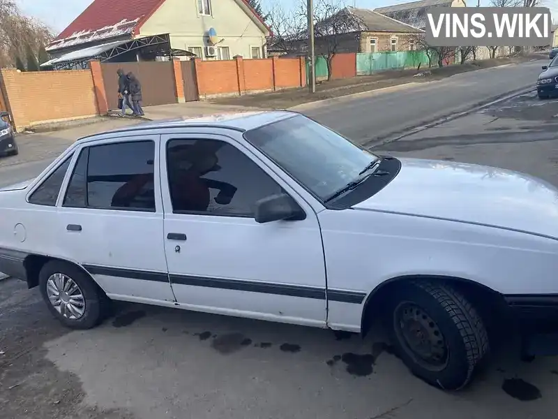 Седан Opel Kadett 1990 1.4 л. Ручна / Механіка обл. Дніпропетровська, Дніпро (Дніпропетровськ) - Фото 1/7