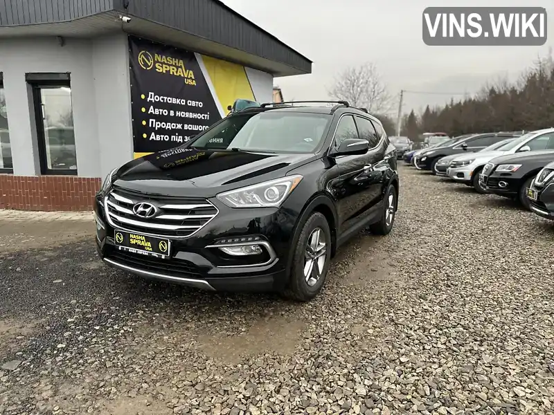 5NMZU3LB8HH025475 Hyundai Santa FE 2016 Позашляховик / Кросовер 2.36 л. Фото 2