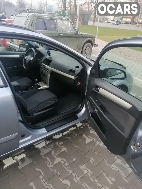 W0L0AHL3582124761 Opel Astra 2008 Универсал 1.69 л. Фото 8