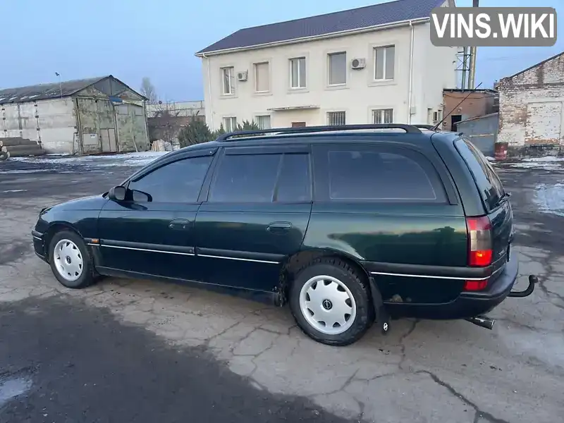 W0L000067L1152976 Opel Omega 1997 Универсал 2 л. Фото 4