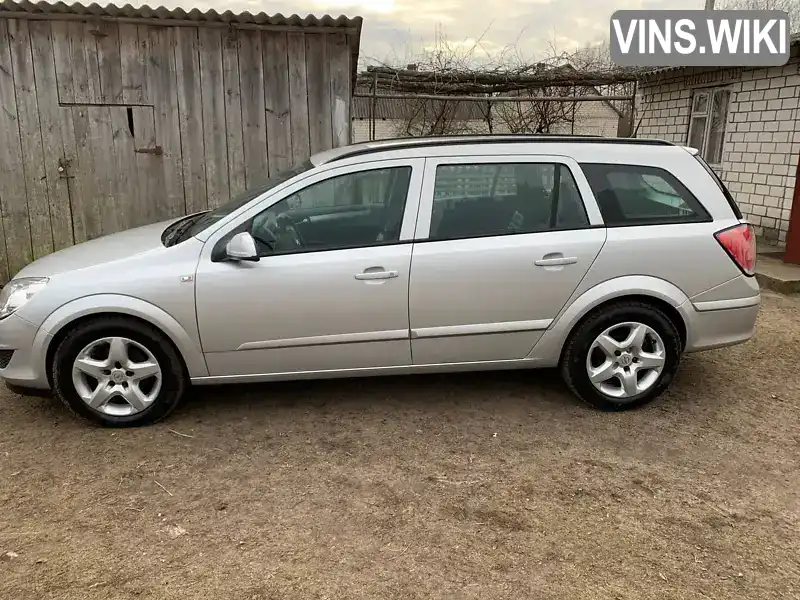 W0L0AHL3582157855 Opel Astra 2008 Универсал 1.69 л. Фото 1